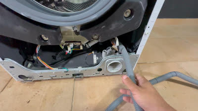 Como cambiar la manguera de desague de la lavadora LG - paso a paso